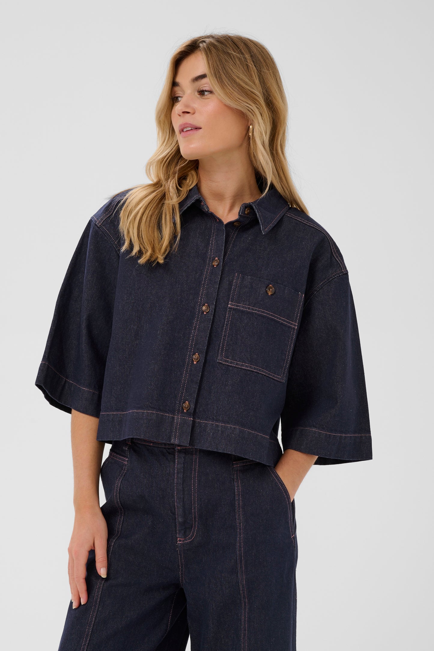 Woman wearing the Saint Tropez Denim Posey Shirt
