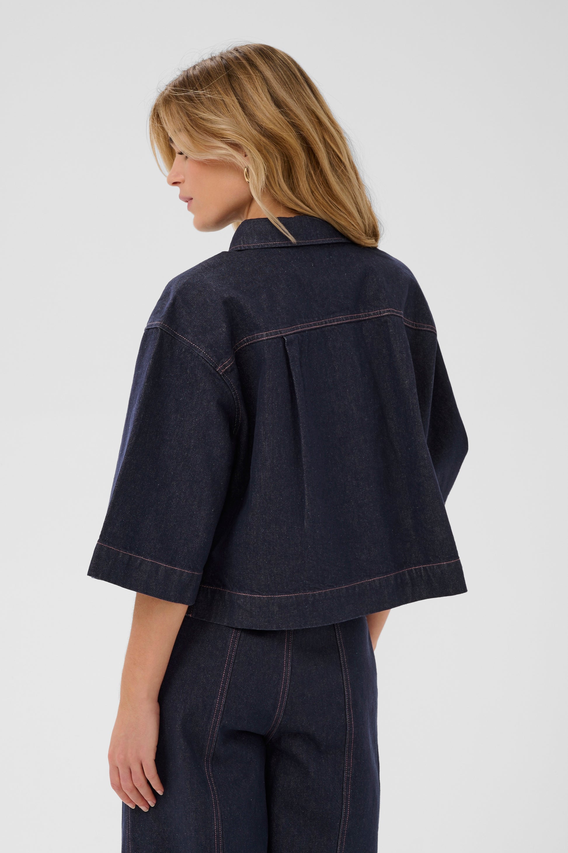 Woman wearing the Saint Tropez Denim Posey Shirt