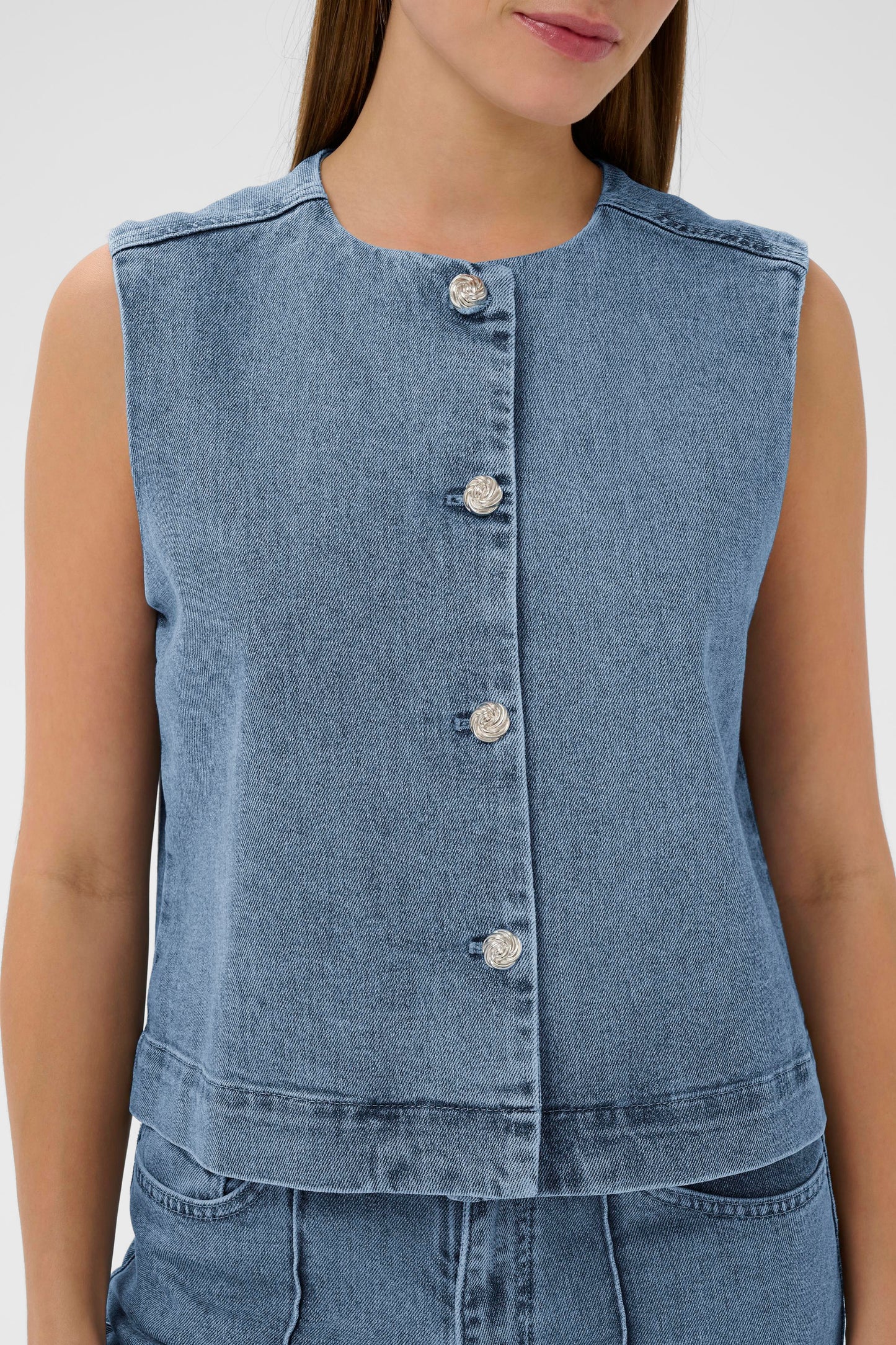 Woman wearing the Soaked in Luxury Rinatina Denim Waistcoat