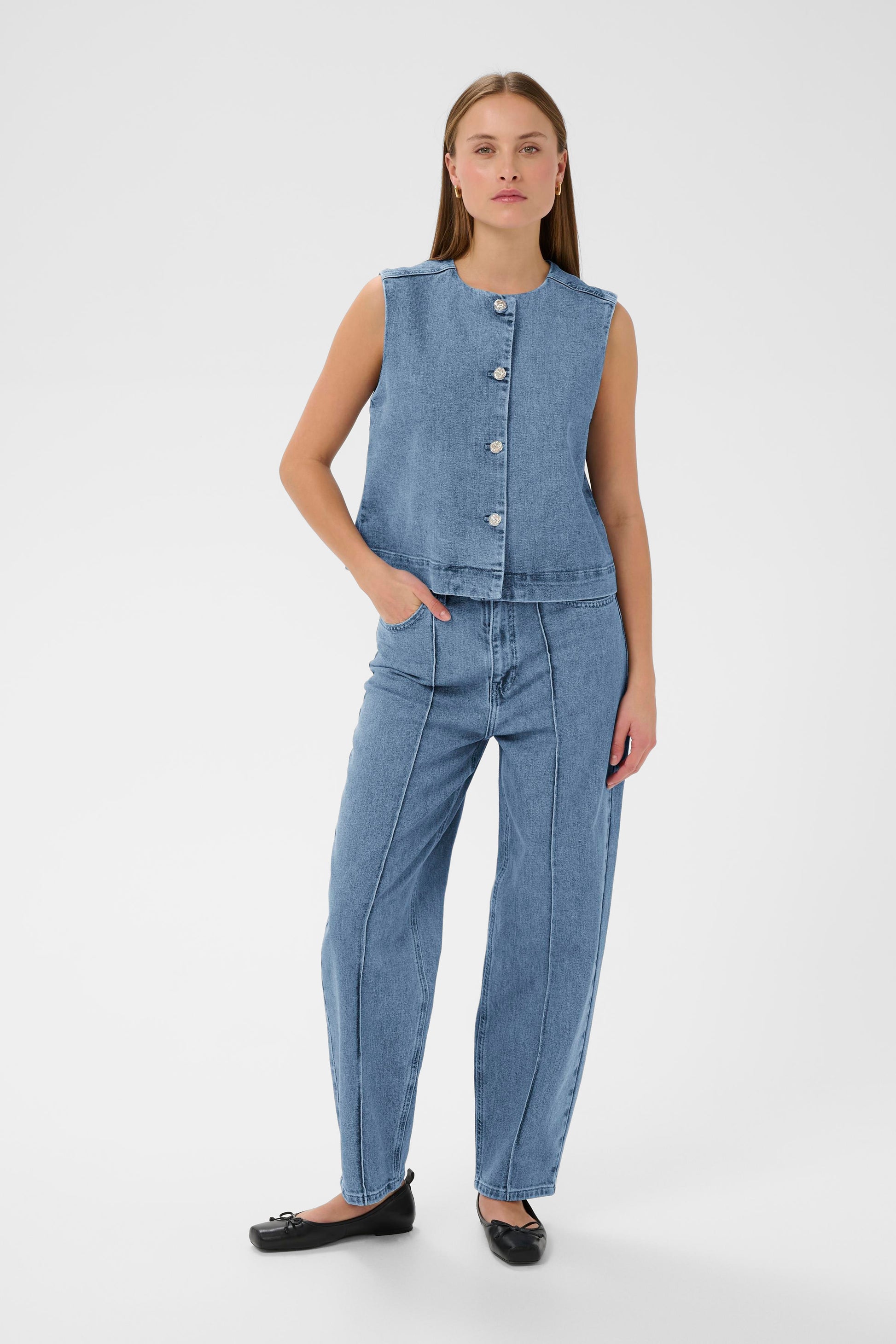 Woman wearing the Soaked in Luxury Rinatina Denim Waistcoat