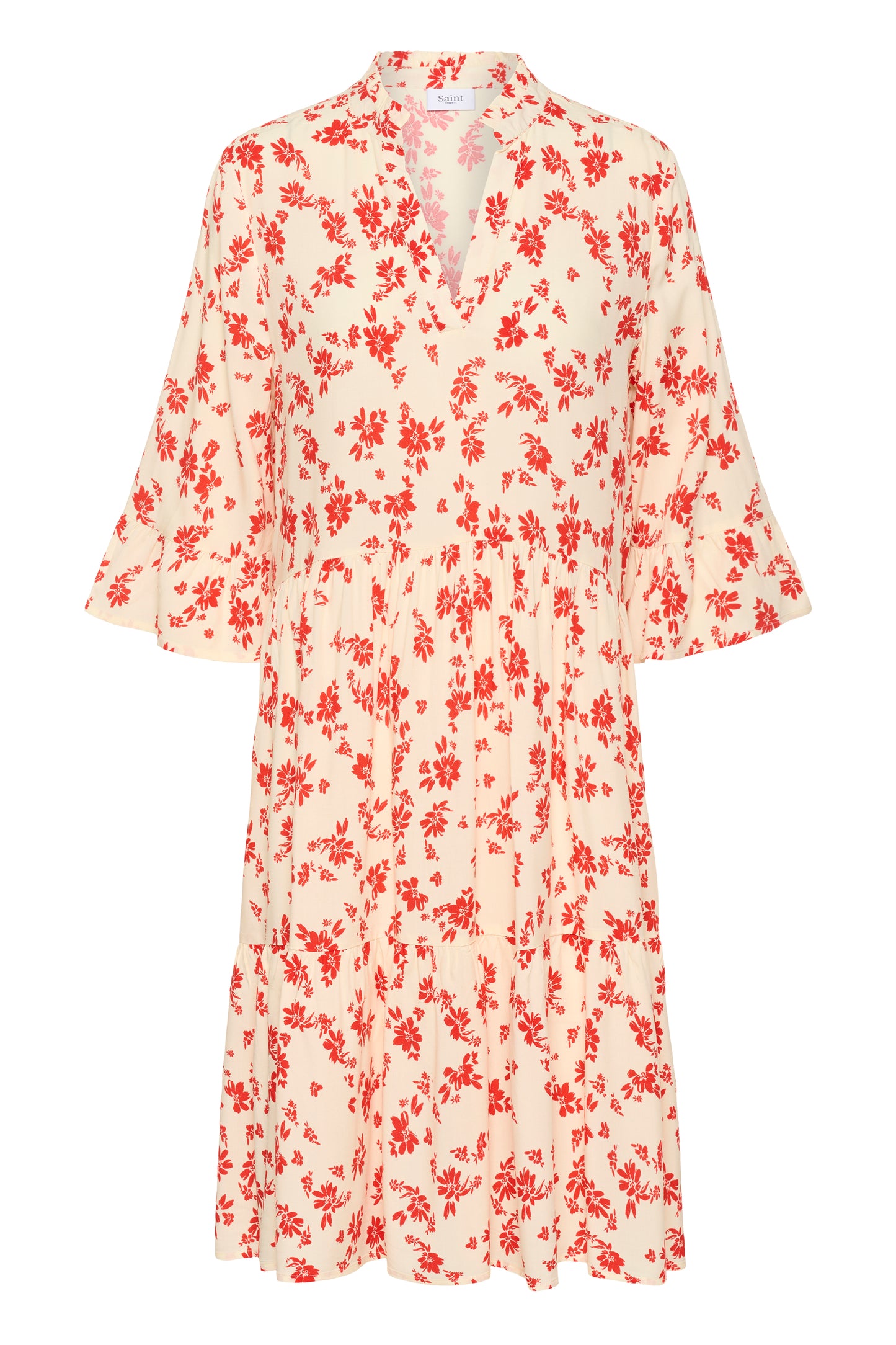 Saint Tropez Eda Dress with 3/4 length sleeves and knee length.  It has organ/red daisy flowers on it