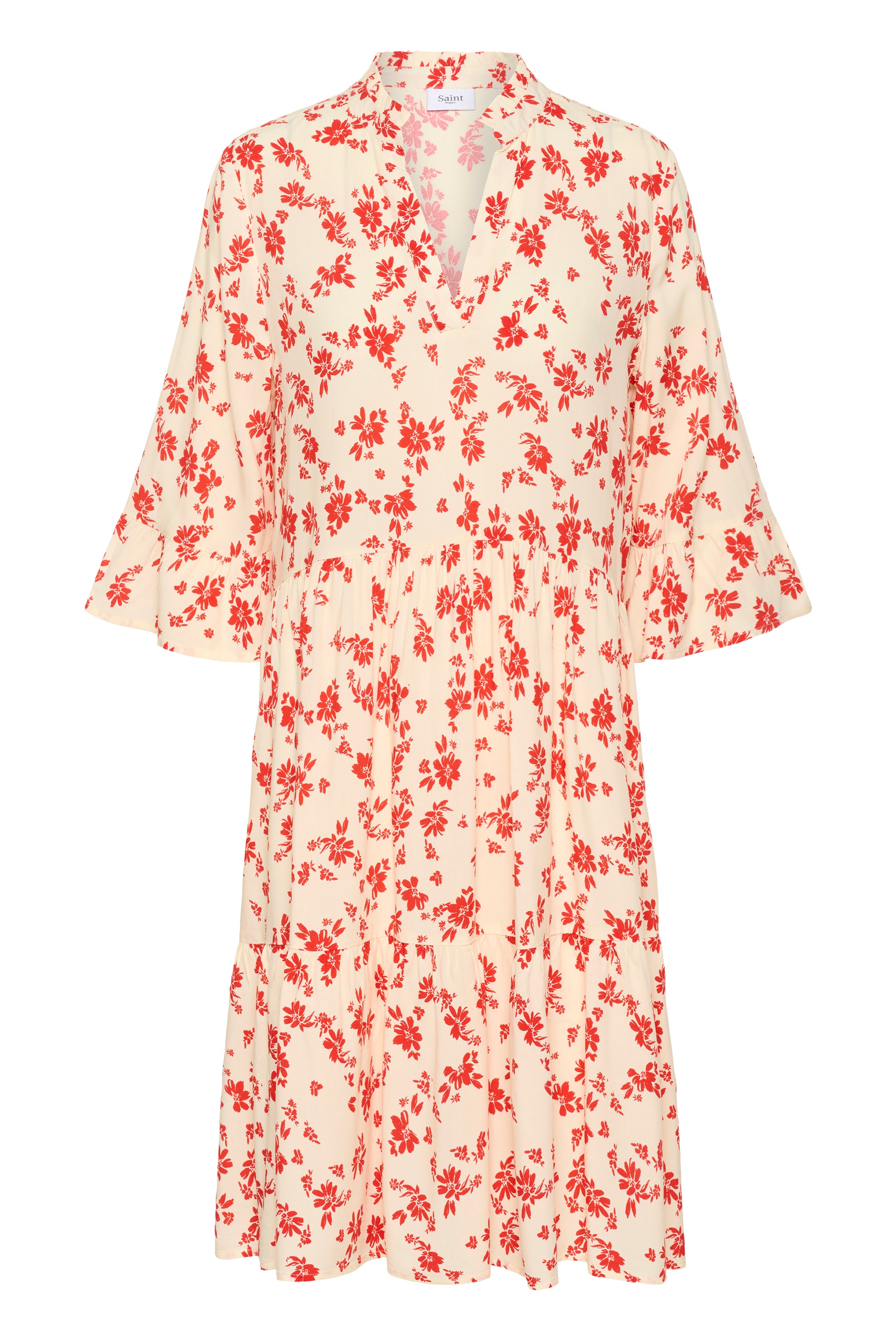 Saint Tropez Eda Dress with 3/4 length sleeves and knee length.  It has organ/red daisy flowers on it