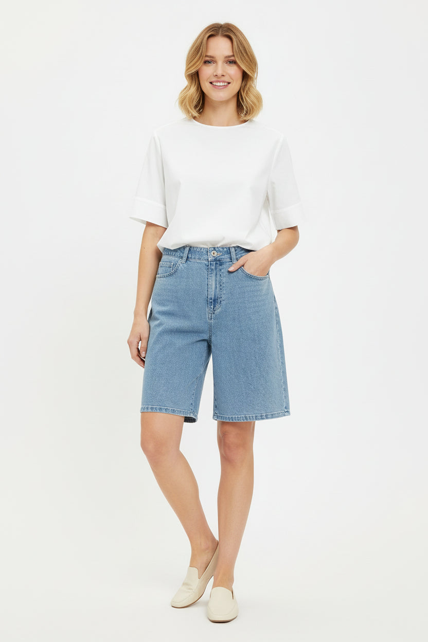 Light blue denim shorts on a white background