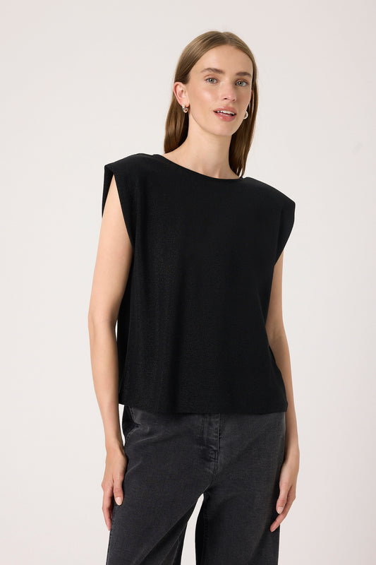 Woman wearing the Soaked in Luxury Skylara Tank top in black with metallic yarn