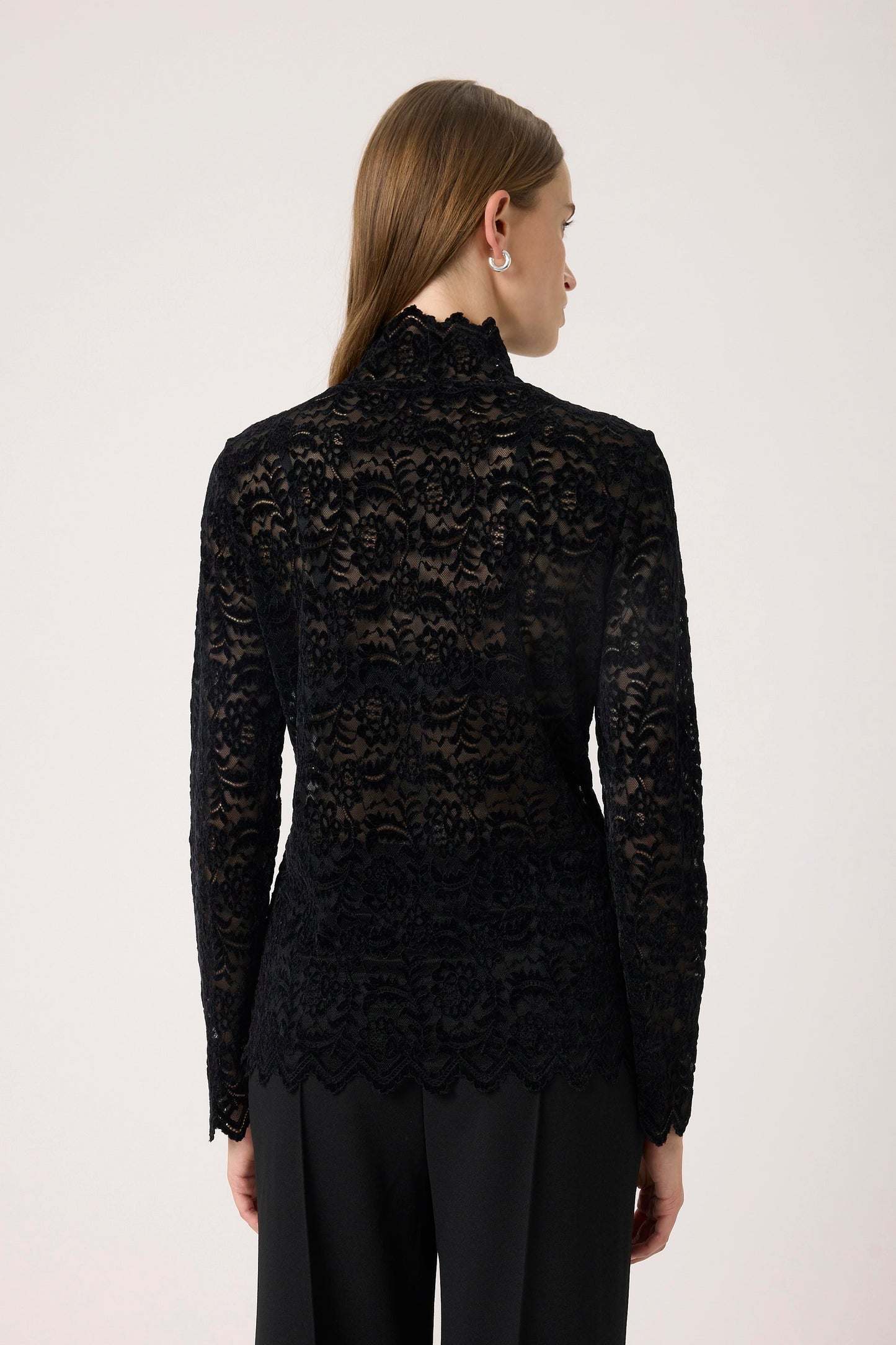 Soaked in Luxury Lace long sleeve top in black view from back