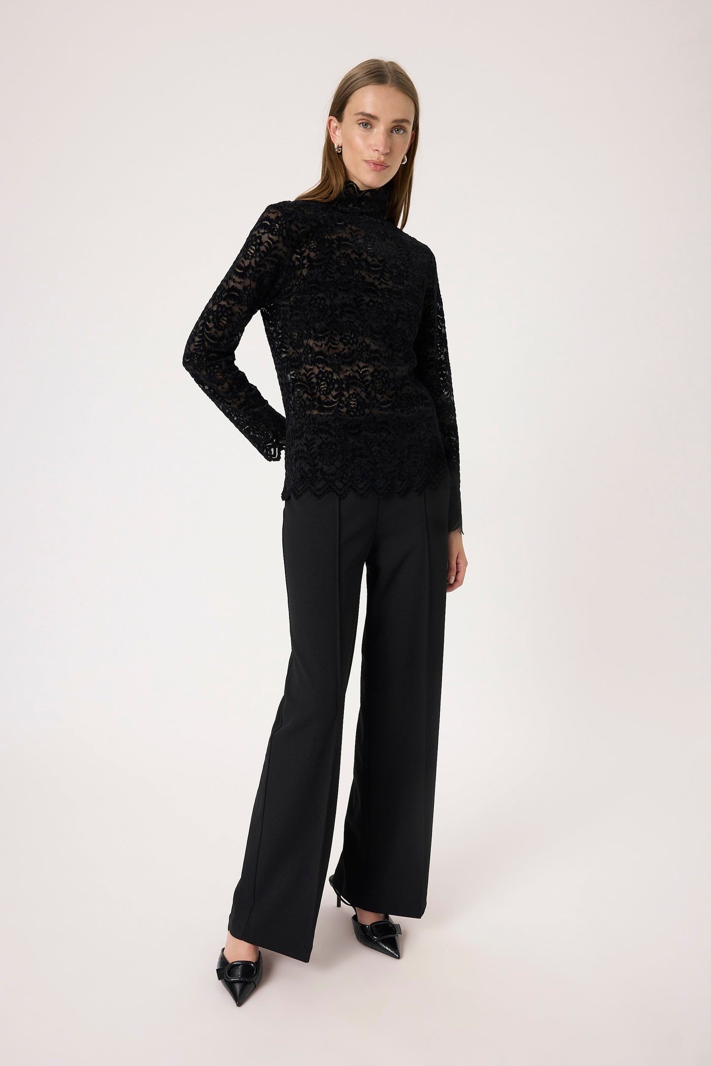Woman wearing the Soaked in Luxury Sable Lace long sleeved top in black