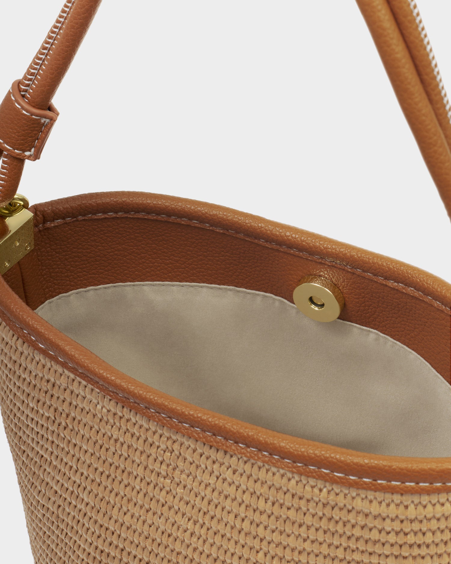 SOrrento Bucket bag in natural raffia and cognac trim