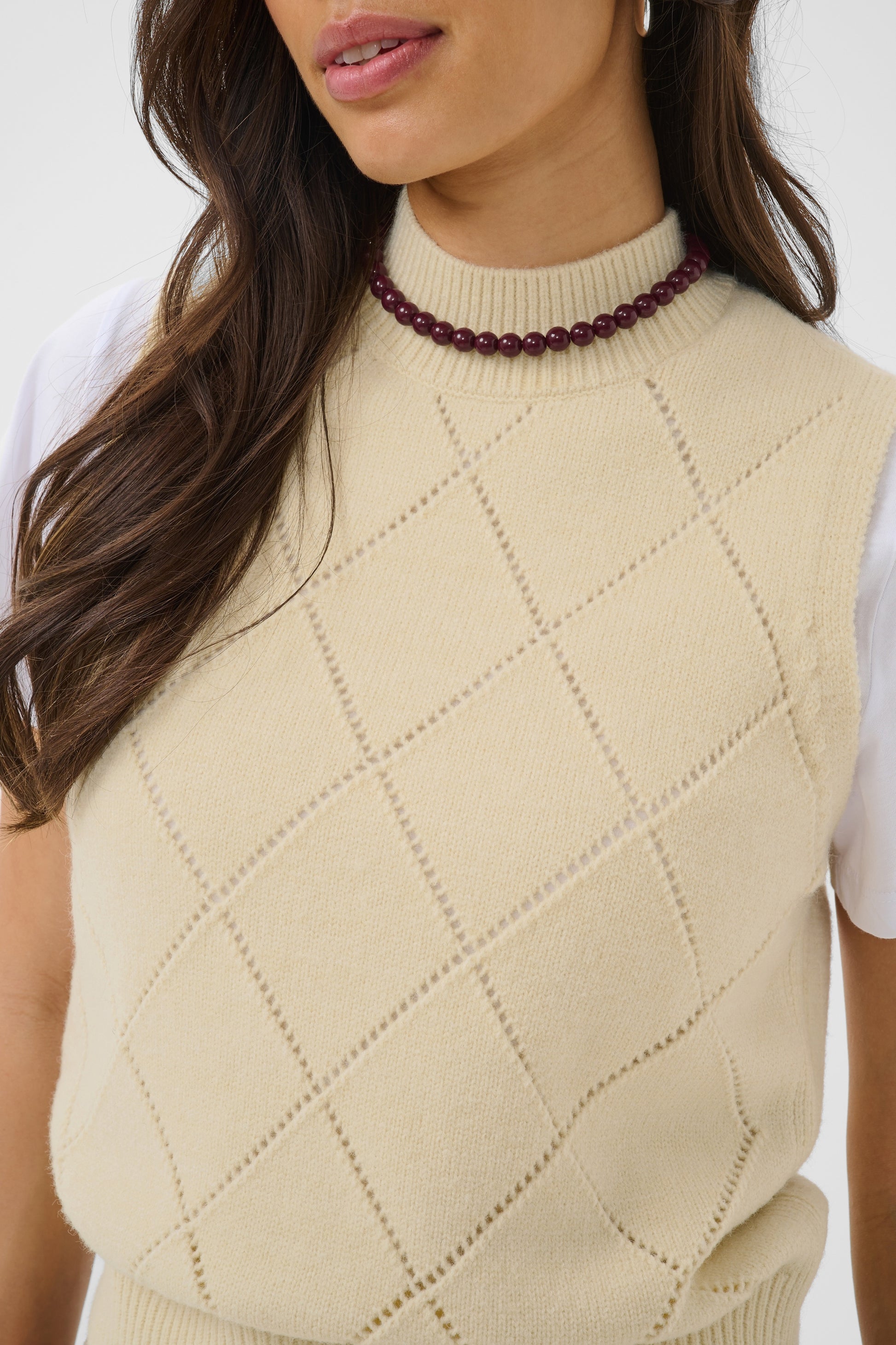 Saint Tropez Theresa Vest in Frozen Dew cream with subtle diamond knit pattern and sleeveless design