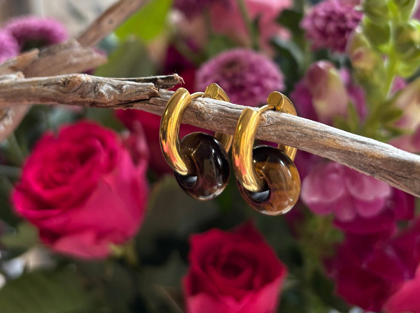 Tigers eye doughnut huggie earrings.