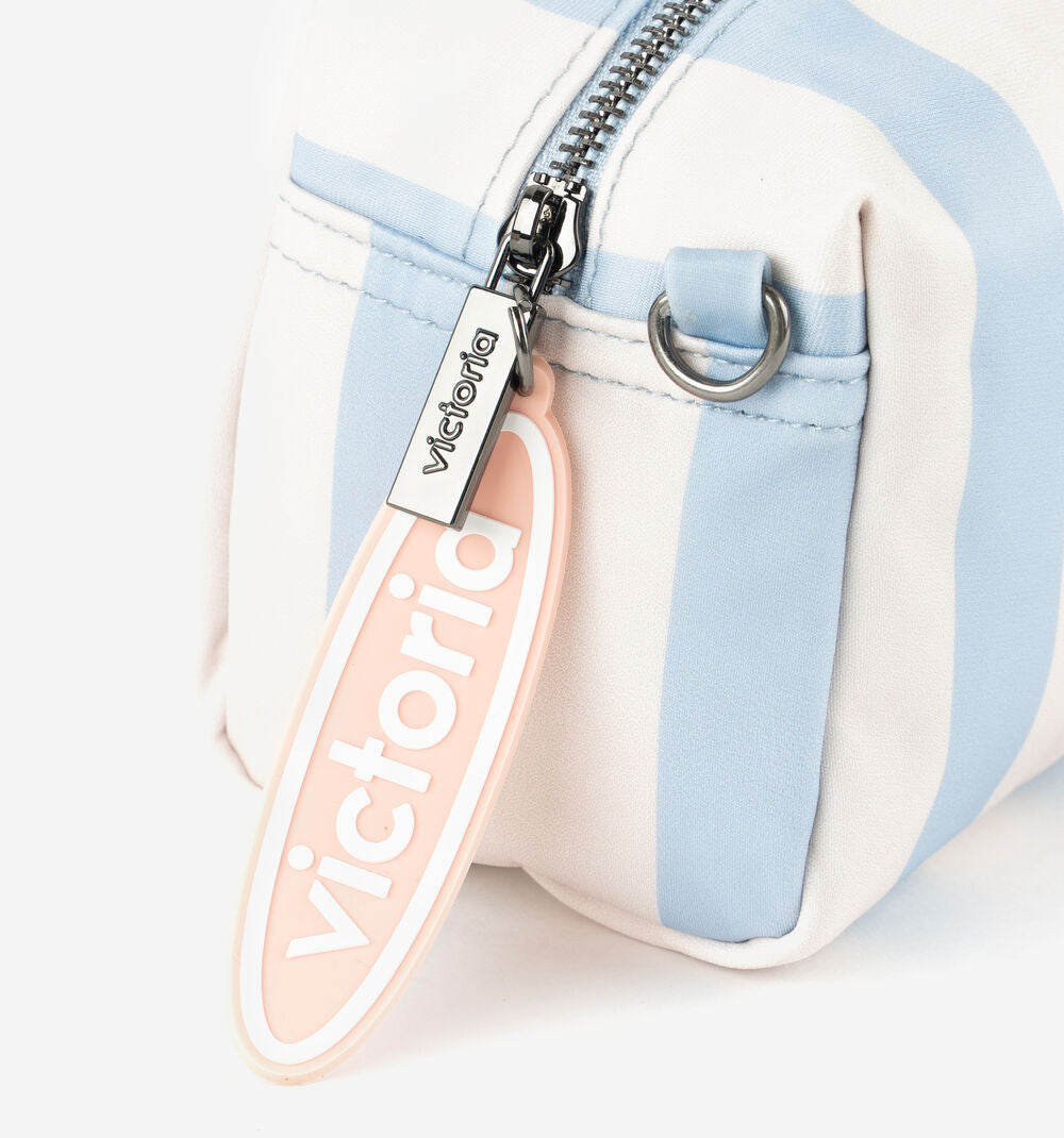 Victoria striped toiletry bag with zip fastening hanging charm and metallic brand plate in azul or amarillo