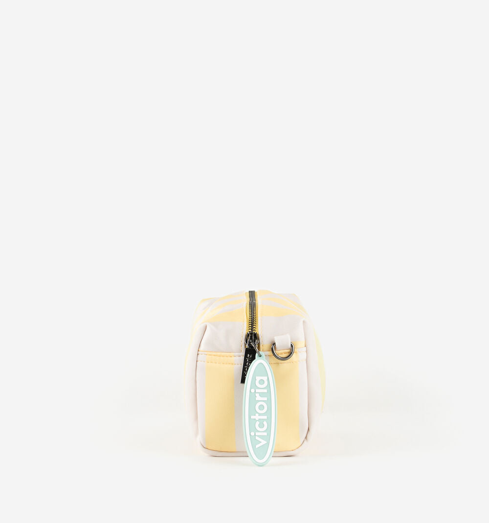 Victoria striped toiletry bag with zip fastening hanging charm and metallic brand plate in azul or amarillo