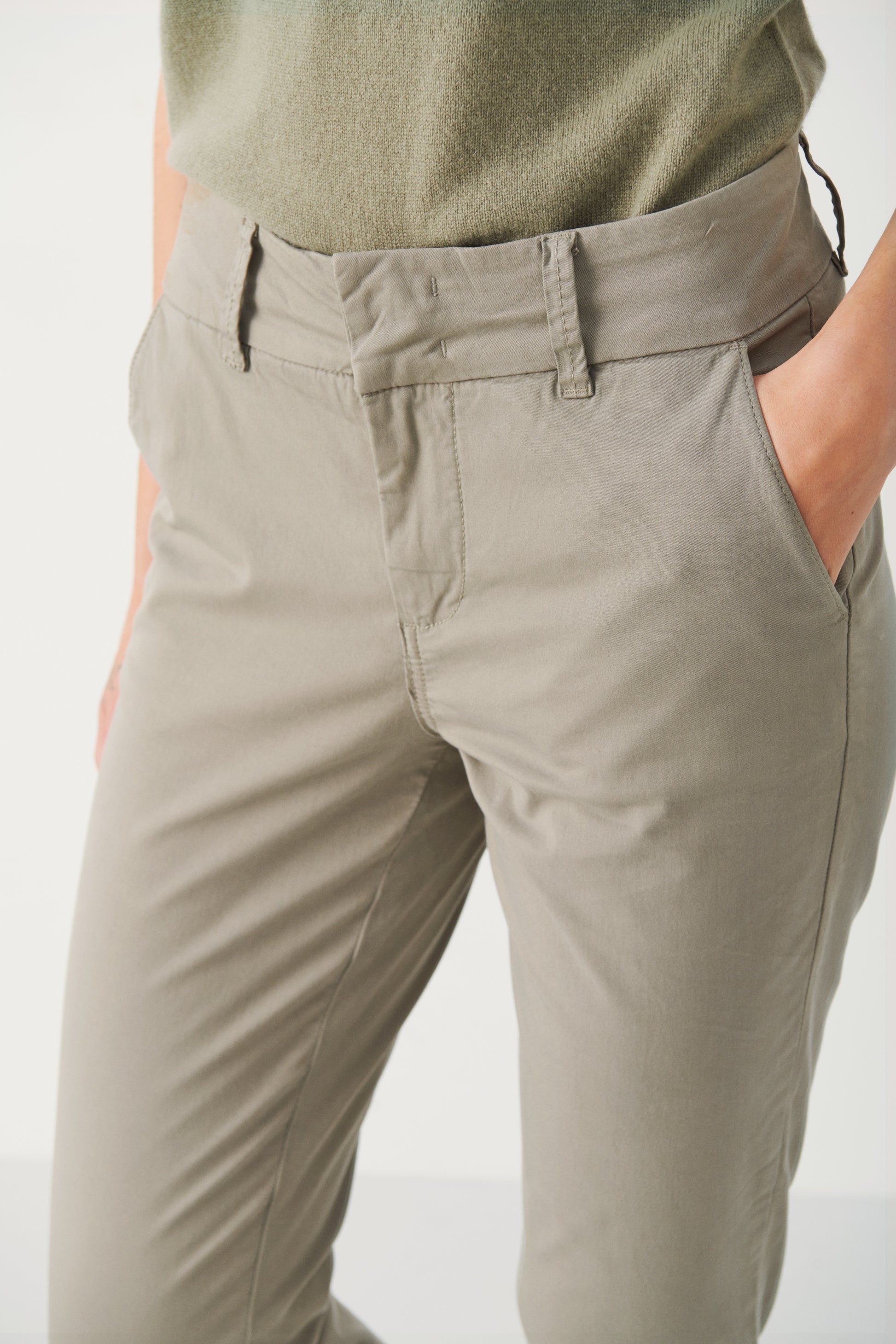 Woman wearing the Part Two Soffys cropped trouser in vetiver green