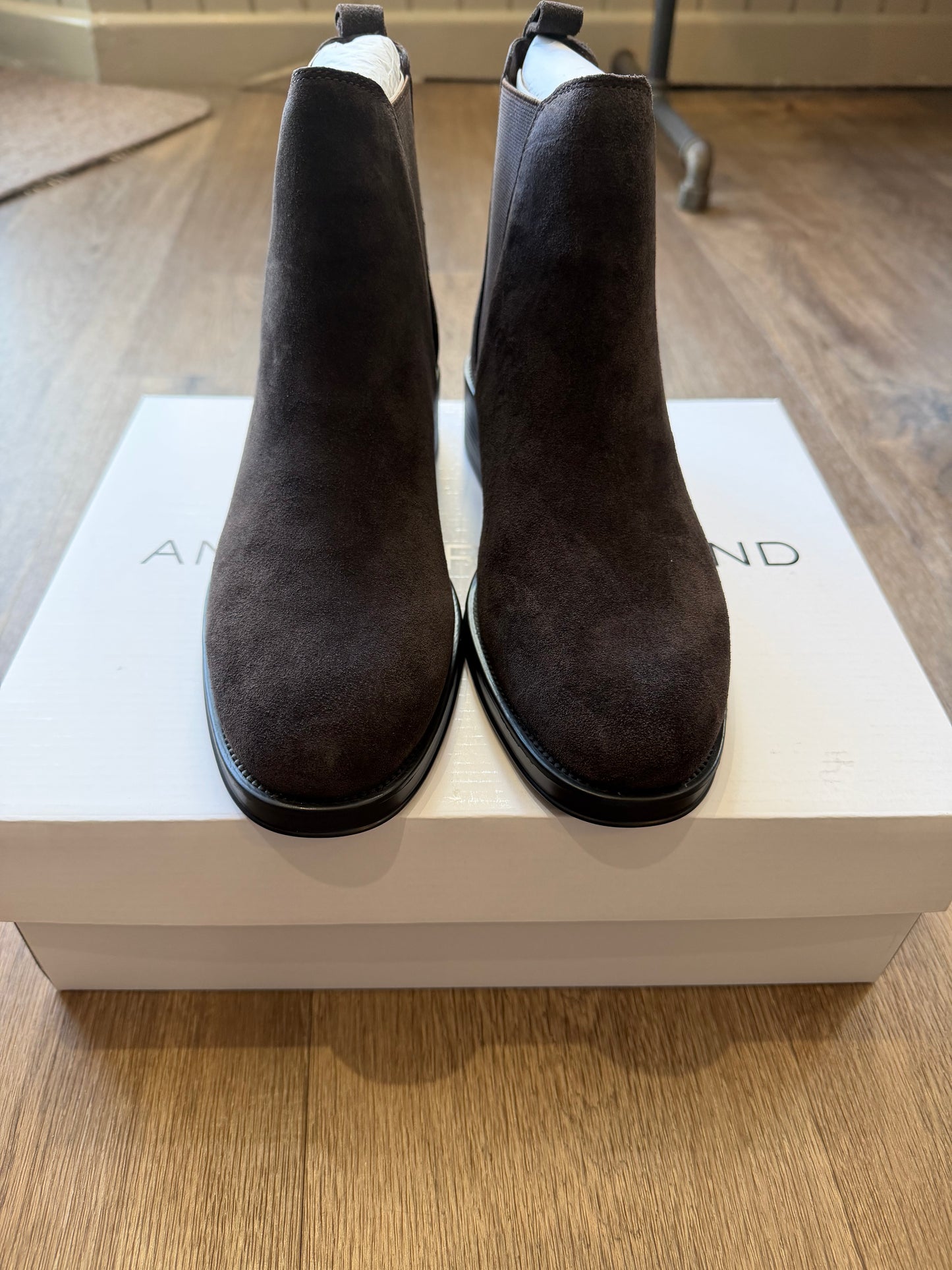 Another Trend Cafe suede-look Chelsea ankle boots featuring elasticated side panels, pull tabs and low black block heel.