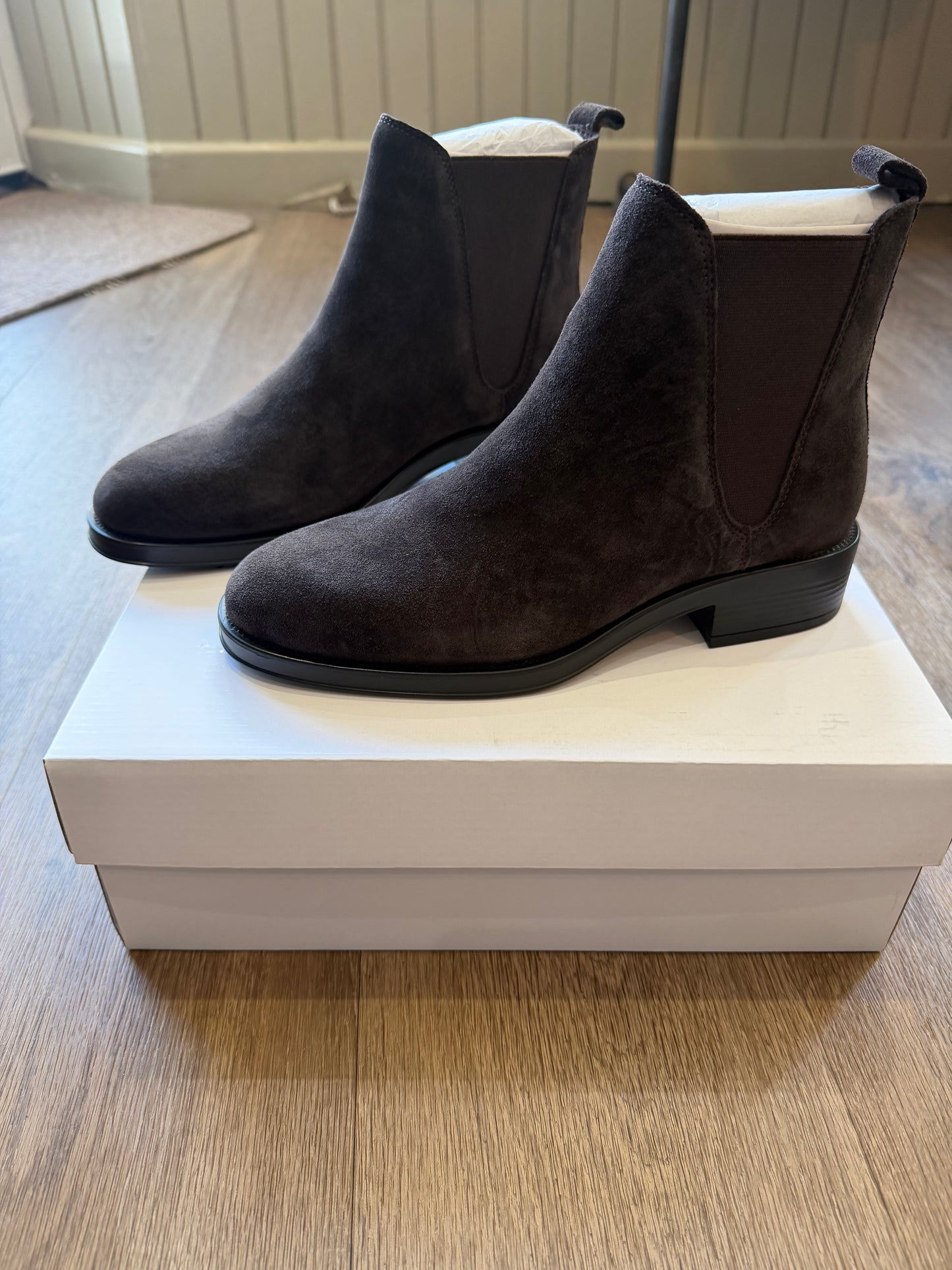 Another Trend Cafe suede-look Chelsea ankle boots featuring elasticated side panels, pull tabs and low black block heel.