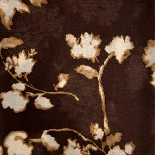 Floral patterned scarf on a brown background