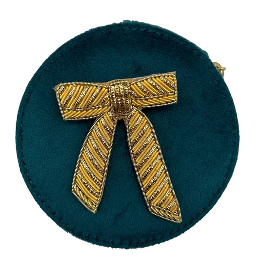 gold bow on teal travel jewellery case