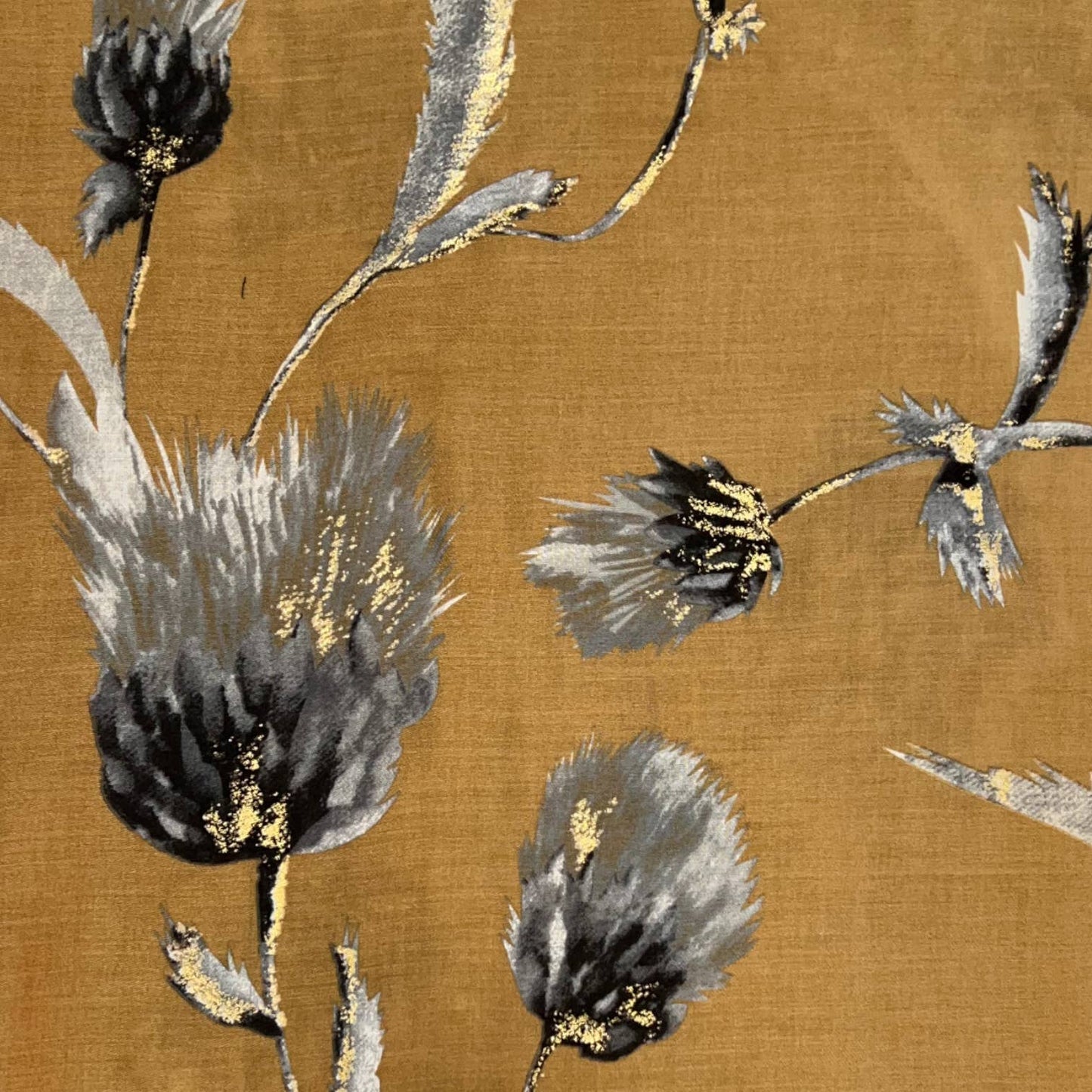 Floral pattern with black and gray flowers on a brown background