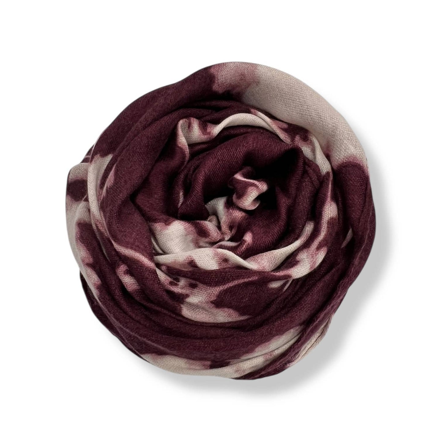 Woven scarf with a maroon and beige pattern on a white background