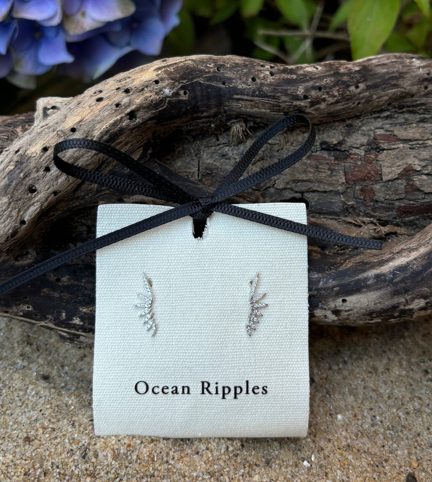 Ocean Ripples 925 sterling silver cubic zirconia celestial wings earrings.