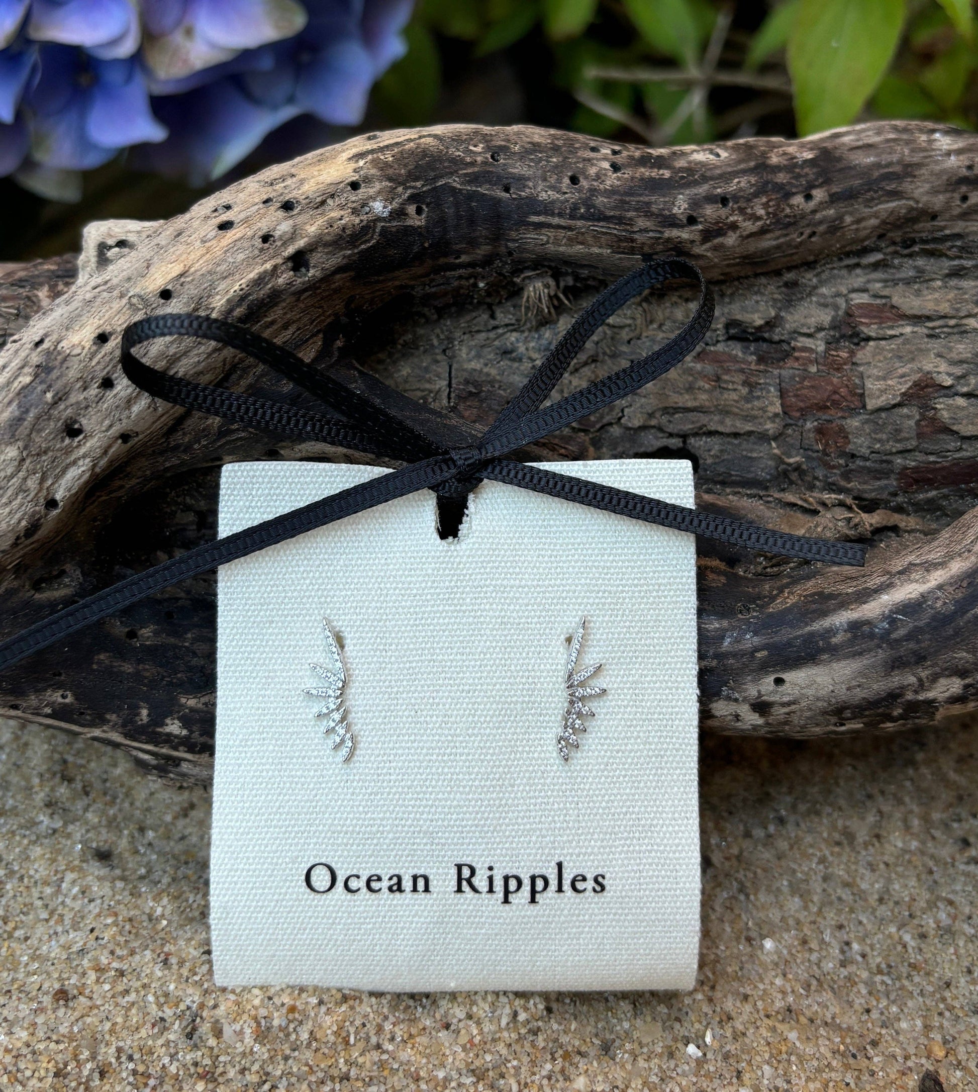 Ocean Ripples 925 sterling silver cubic zirconia celestial wings earrings.