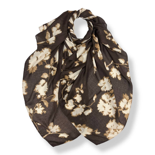 Floral patterned scarf on a brown background